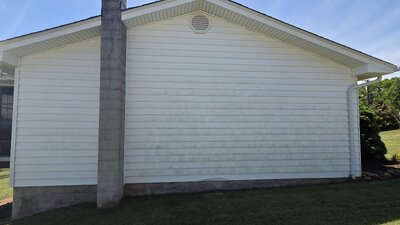 Before house washing - dirty exterior siding